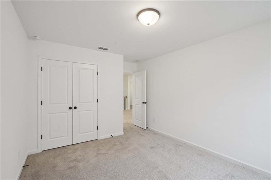Spacious, unfurnished interior of a new home in Eastlyn Crossing, Flowery Branch (Image 27). Spacious, unfurnished interior of a new home in Eastlyn Crossing, Flowery Branch (Image 27).