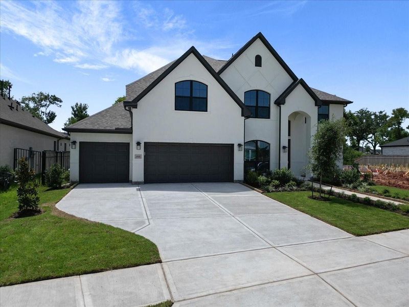 Front exterior of a new home in , Missouri City, TX, highlighting curb appeal (Image 23).