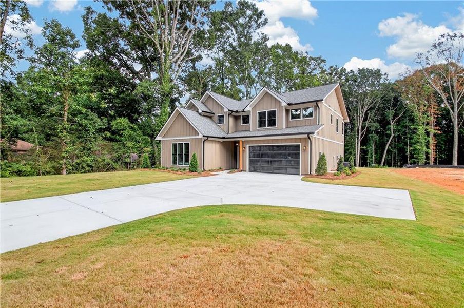 Front exterior of a new home in , Stone Mountain, GA, highlighting curb appeal (Image 35). Front exterior of a new home in , Stone Mountain, GA, highlighting curb appeal (Image 35).