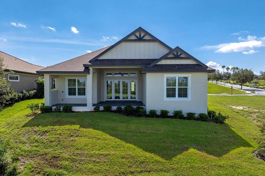 Front exterior of a new home in , Auburndale, FL, highlighting curb appeal (Image 23).