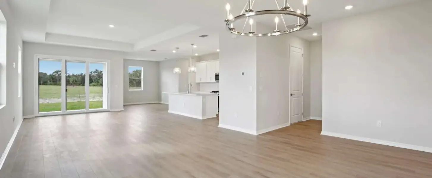 Open concept dining, family room and kitchen - Representative images and renderings are for illustrative purposes. Actual structural options and design finishes of home may vary.