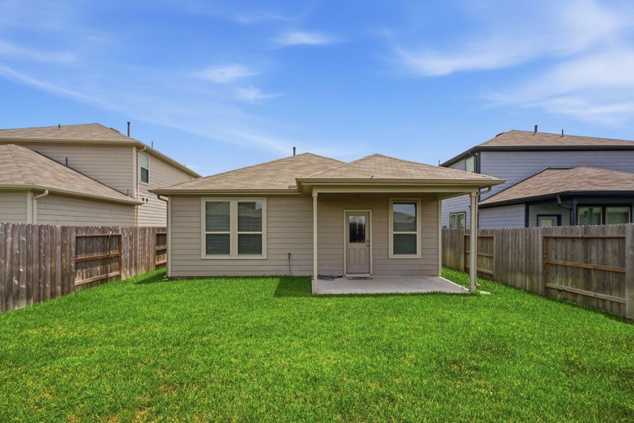Exterior details and patio area of a home in Mavera, Conroe (Image 3). Exterior details and patio area of a home in Mavera, Conroe (Image 3).