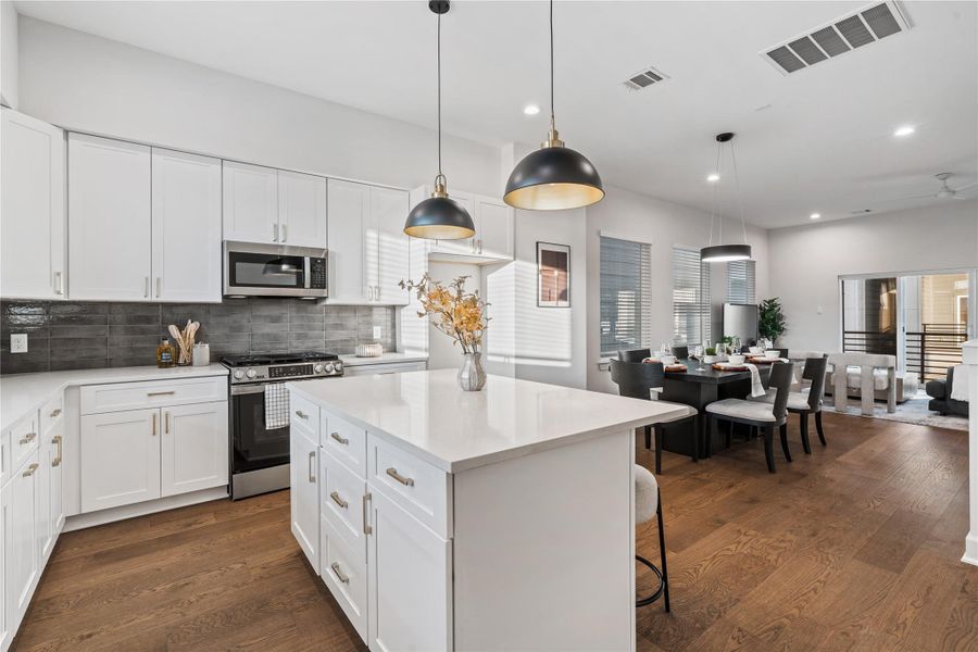 With its seamless flow, the home allows you to cook in the kitchen and still be part of what’s happening in the dining or living room.