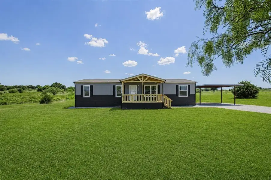 Exterior details and patio area of a home in , Poolville (Image 22).