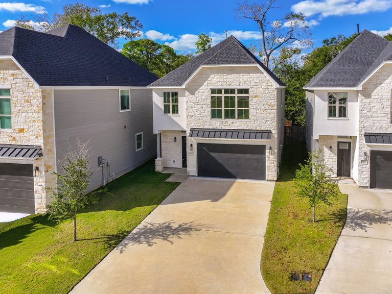 Front exterior of a new home in , Houston, TX, highlighting curb appeal (Image 23).