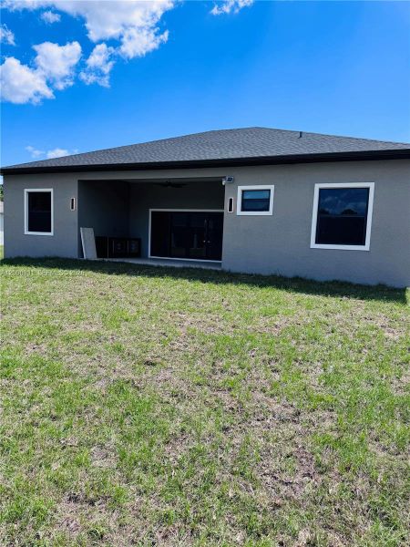 Exterior details and patio area of a home in , Port Charlotte (Image 25).