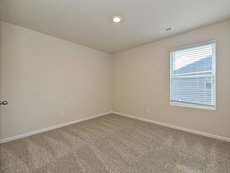 Customize a secondary bedroom into a relaxing guest room.