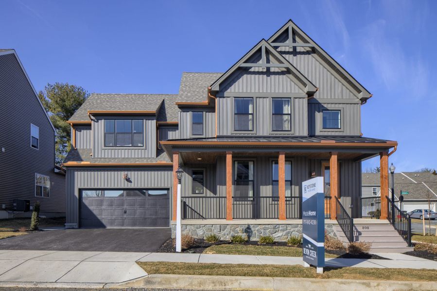 Representative exterior photo of a completed home built from the Sebastian by Keystone Custom Homes in Lakestone Cove, Belmont, NC (Image 12).