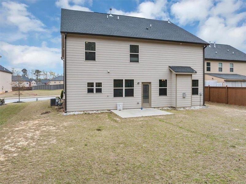 Exterior details and patio area of a home in Independence, Loganville (Image 29).
