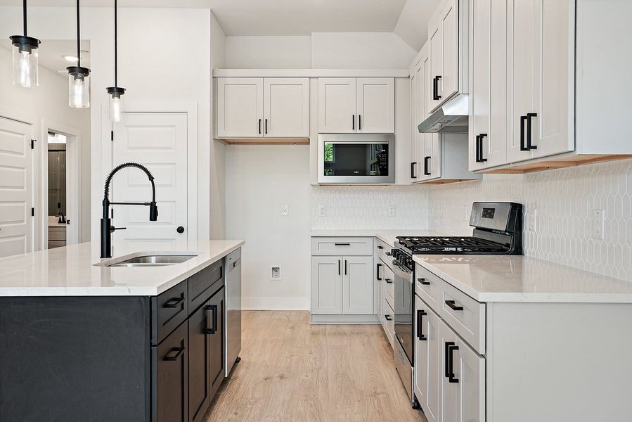 Furnished interior view inside a new home in Koenig Townhomes, Austin (Image 8).