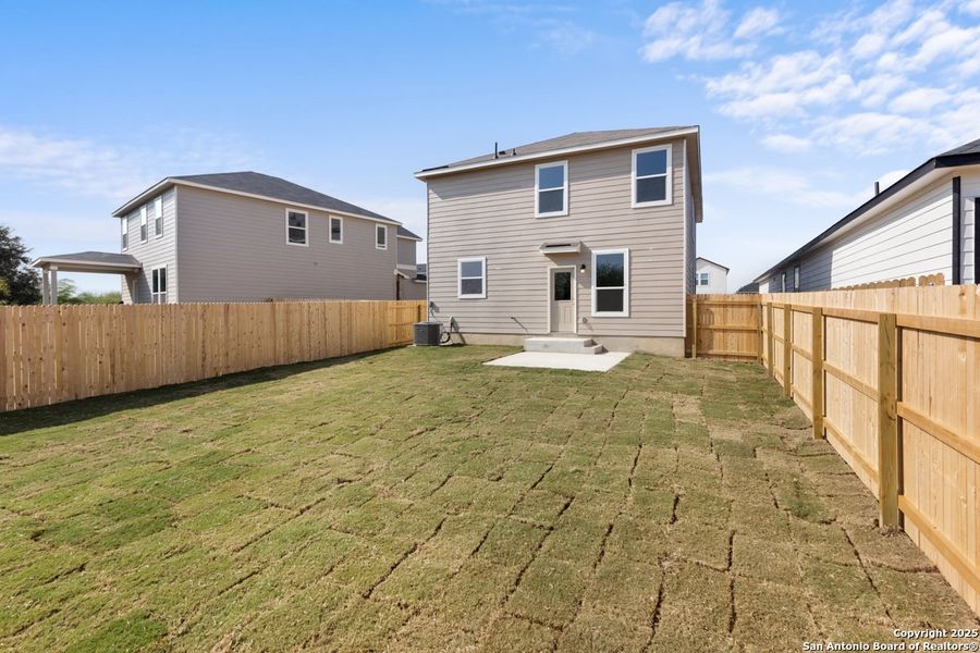 Exterior details and patio area of a home in Southton Cove, Elmendorf (Image 3).