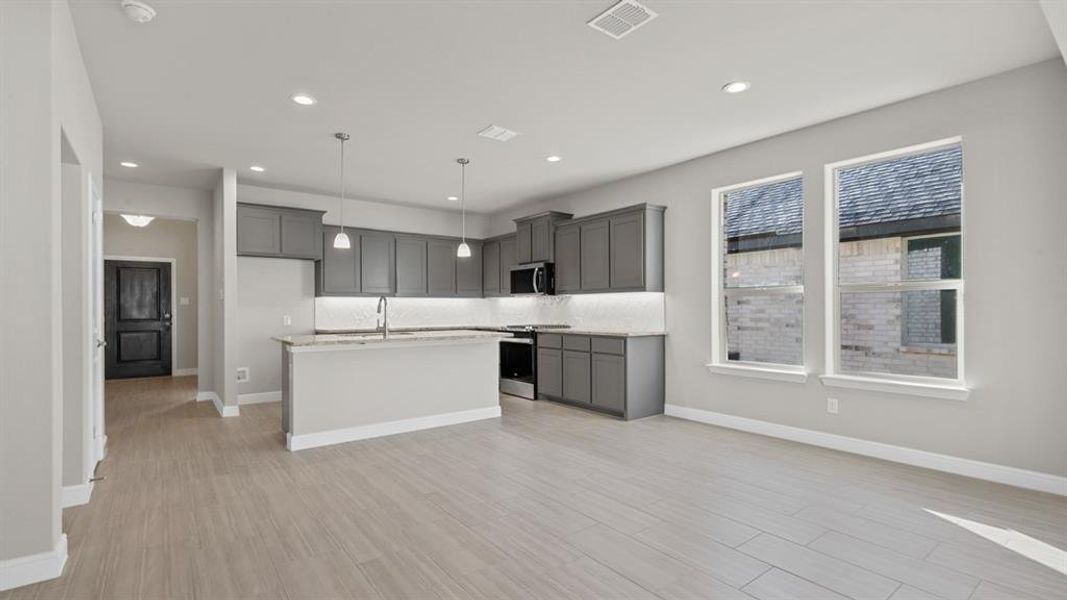 Furnished interior view inside a new home in Pecan Square, Northlake (Image 10). Furnished interior view inside a new home in Pecan Square, Northlake (Image 10).