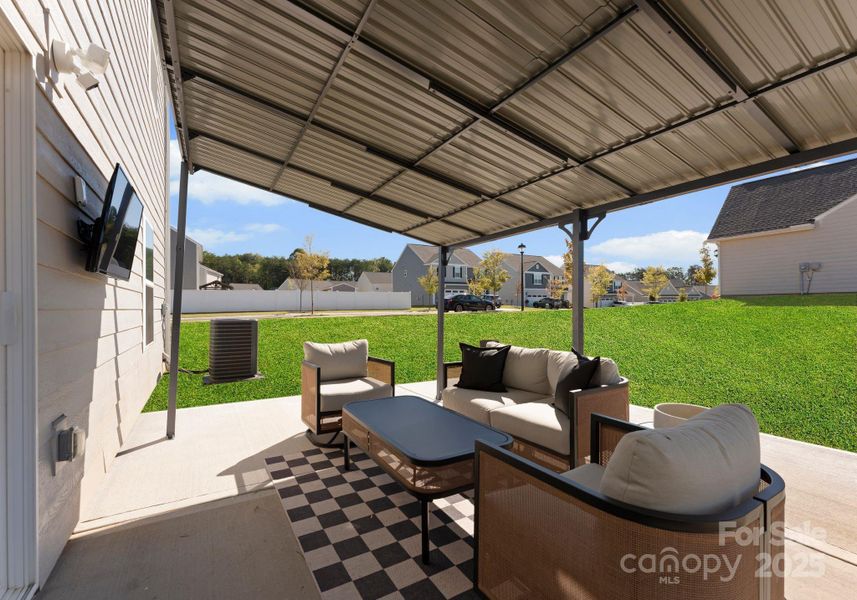 Exterior details and patio area of a home in , Troutman (Image 21).