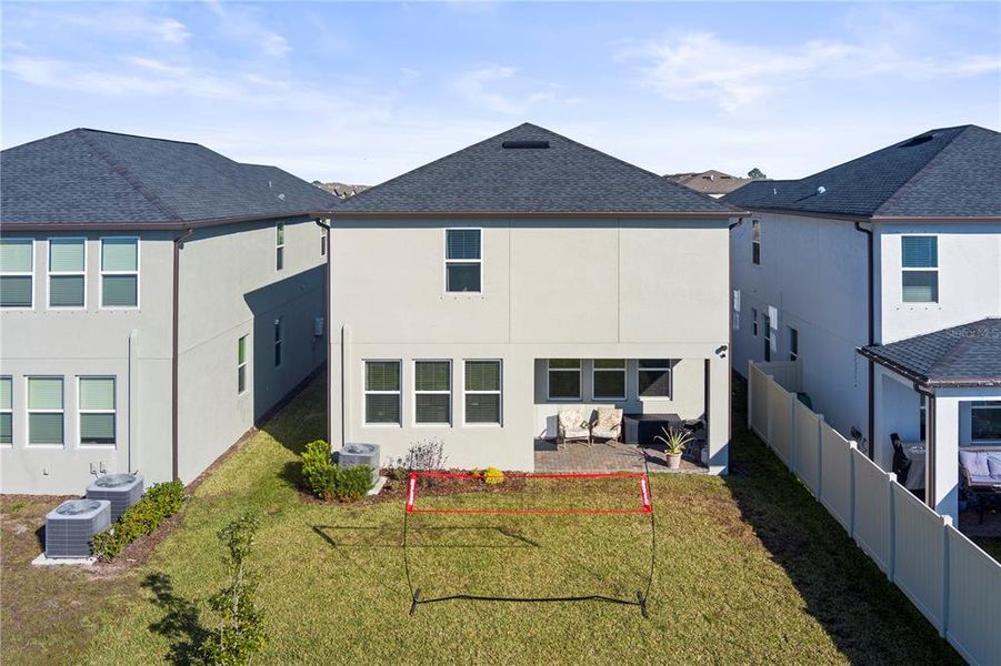 Exterior details and patio area of a home in Bryant Square: The Manors, New Port Richey (Image 4).