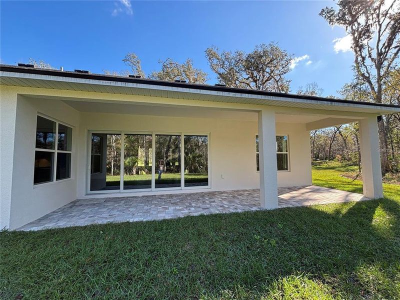 Exterior details and patio area of a home in , Brooksville (Image 22).