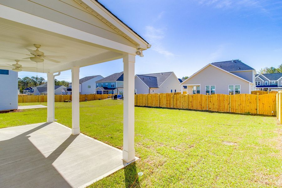 Exterior details and patio area of a home in Pebble Branch, Chapin (Image 4).
