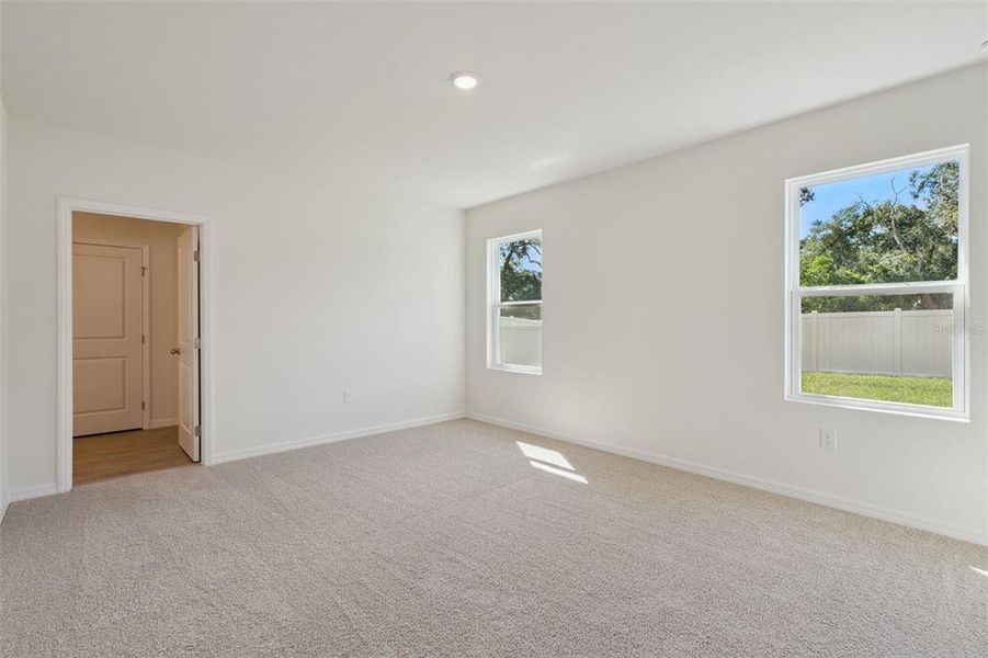 Spacious, unfurnished interior of a new home in Wexford Cove, Ormond Beach (Image 8).