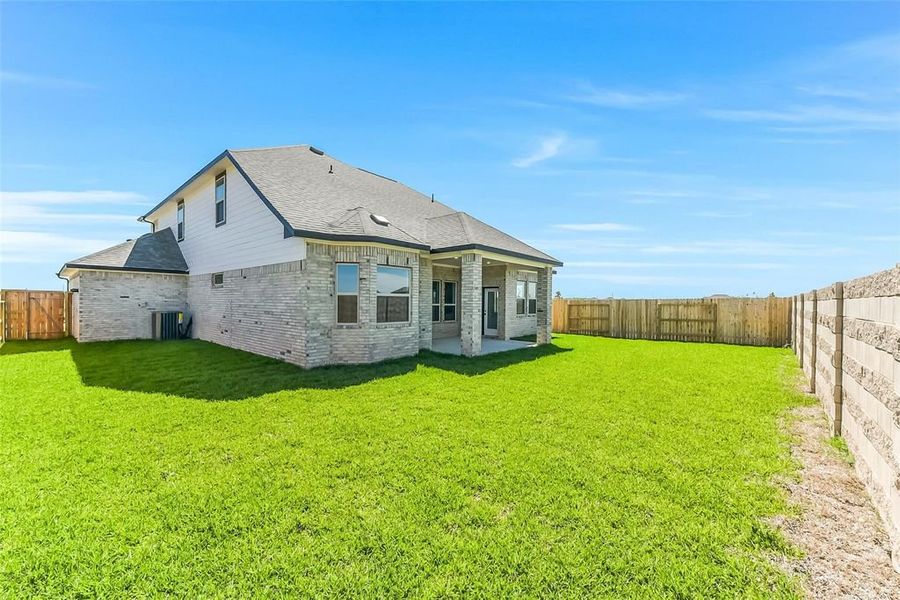Exterior details and patio area of a home in River Ranch Meadows, Dayton (Image 2).