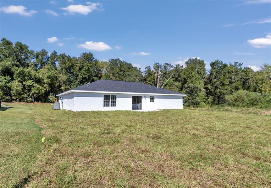Exterior details and patio area of a home in , Ocala (Image 12).