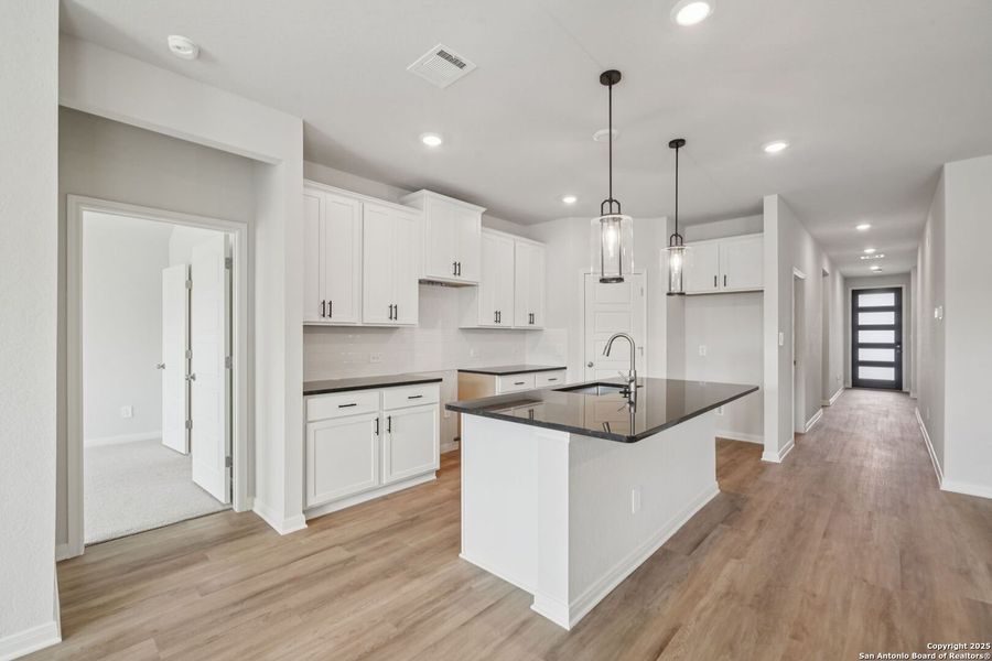 Furnished interior view inside a new home in Arcadia Ridge - Premier Series, San Antonio (Image 11). Furnished interior view inside a new home in Arcadia Ridge - Premier Series, San Antonio (Image 11).