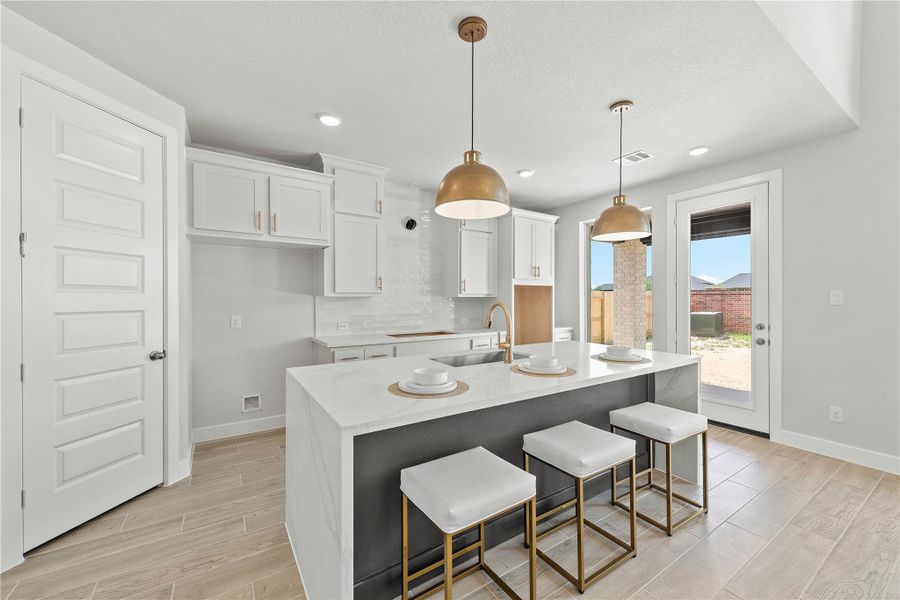 Furnished interior view inside a new home in Sunterra, Katy (Image 14).