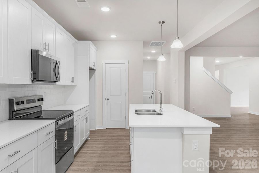 Furnished interior view inside a new home in , Monroe (Image 8).
