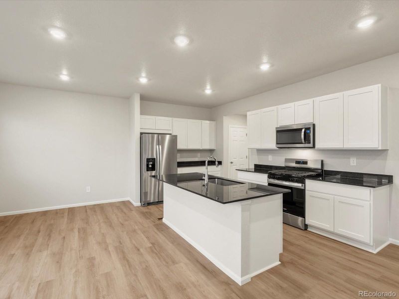 Furnished interior view inside a new home in Lake Bluff, Greeley (Image 9).