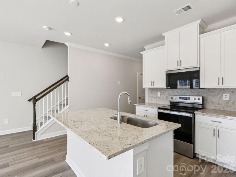 Photo is not of the actual home, but is an inspirational photo of builder’s model home and may depict options, furnishings, and/or decorator features that are not included