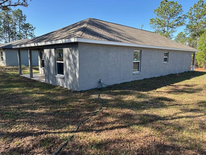 Exterior details and patio area of a home in , Citrus Springs (Image 20).