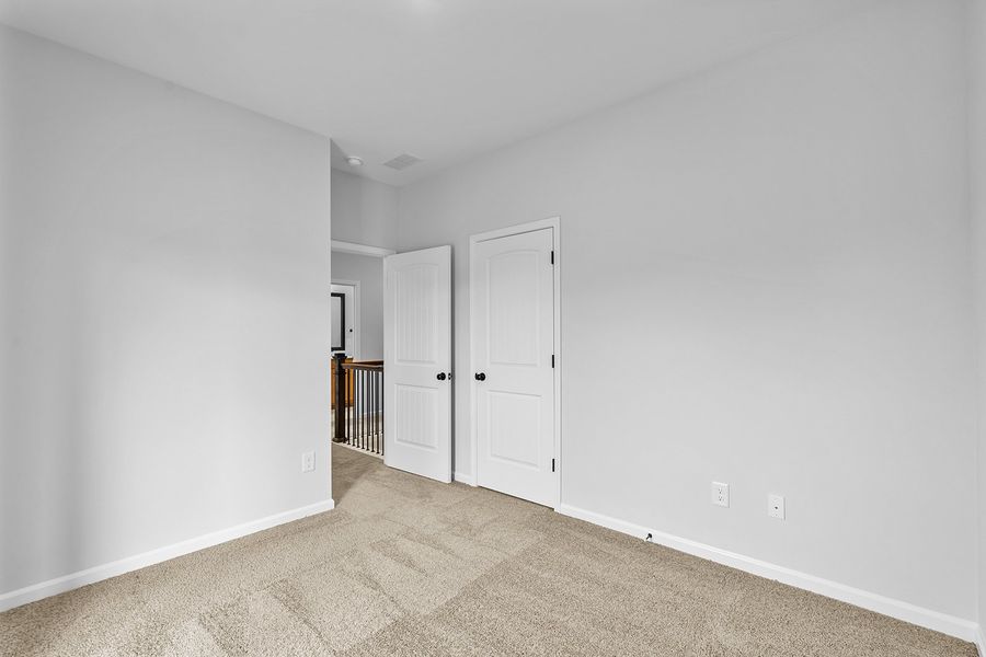 Spacious, unfurnished interior of a new home in Lilah Grove, Summerfield (Image 50).