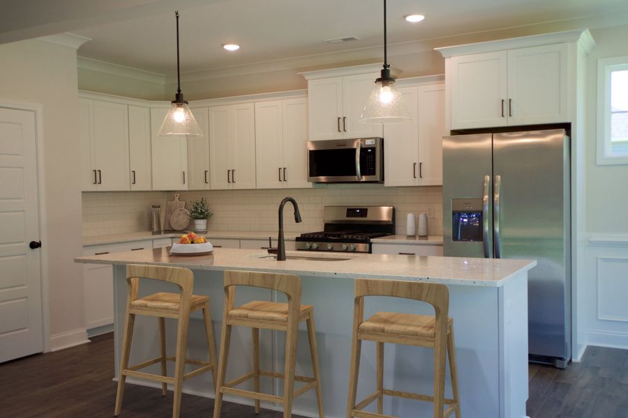 Representative furnished interior of a home built from the Beaufort by Stevens Fine Homes in Parkwood Estates, Leland (Image 6).