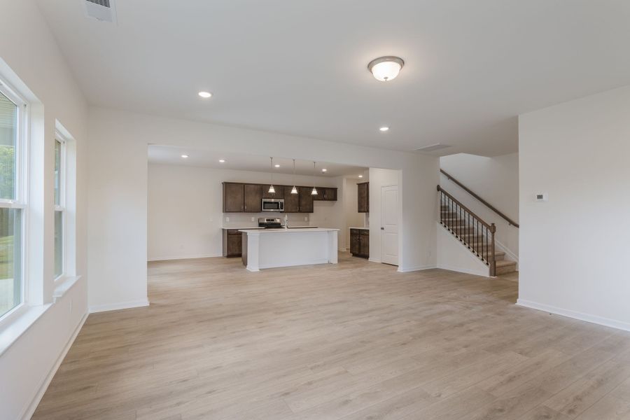 LARGE open living area with tons of natural lighting.