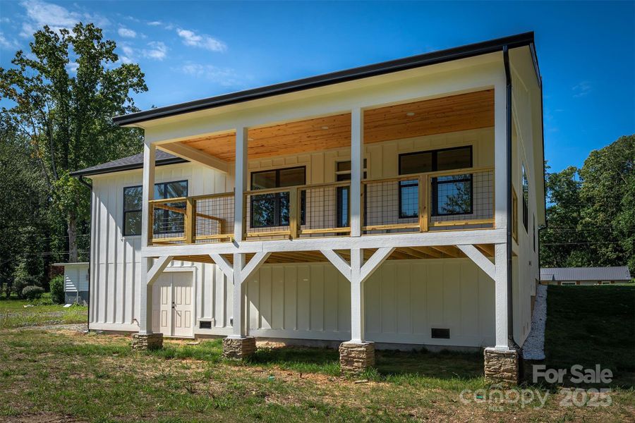 Front exterior of a new home in , Hendersonville, NC, highlighting curb appeal (Image 25).