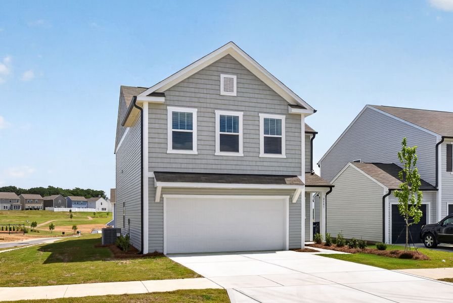 Front exterior of a new home in Morgan Hills, Albemarle, NC, highlighting curb appeal (Image 2).