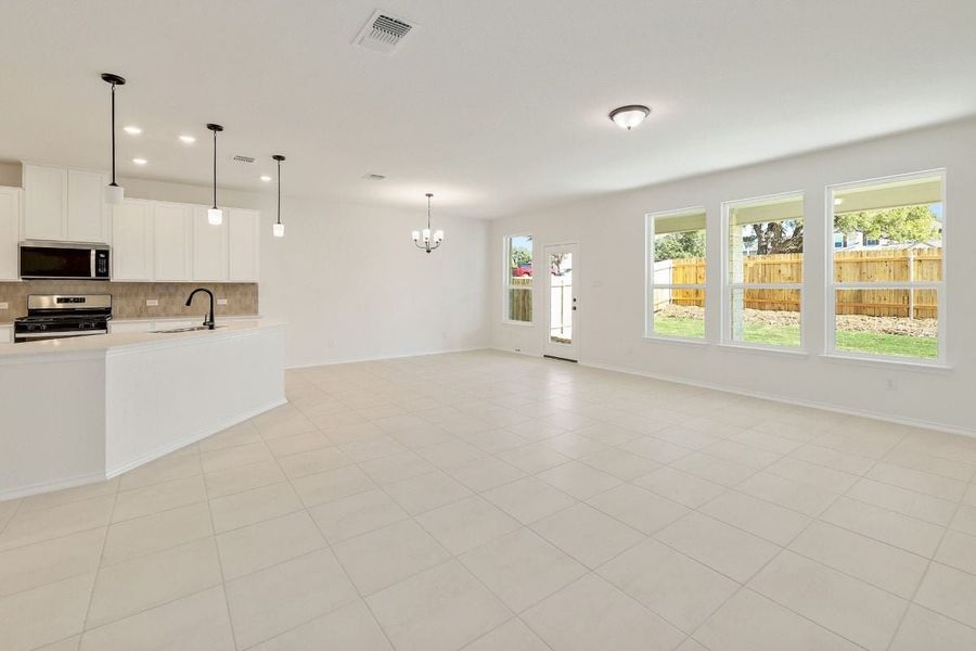Spacious, unfurnished interior of a new home in River Bluff, Leander (Image 6).