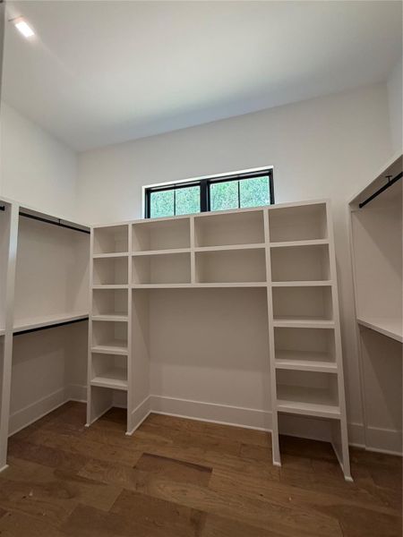 One of two walk in closets in primary bath One of two walk in closets in primary bath