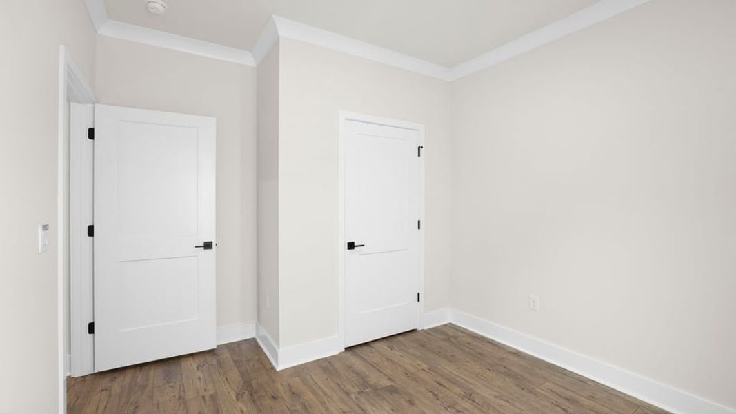 Spacious, unfurnished interior of a new home in Adams Glen, Greenville (Image 30).