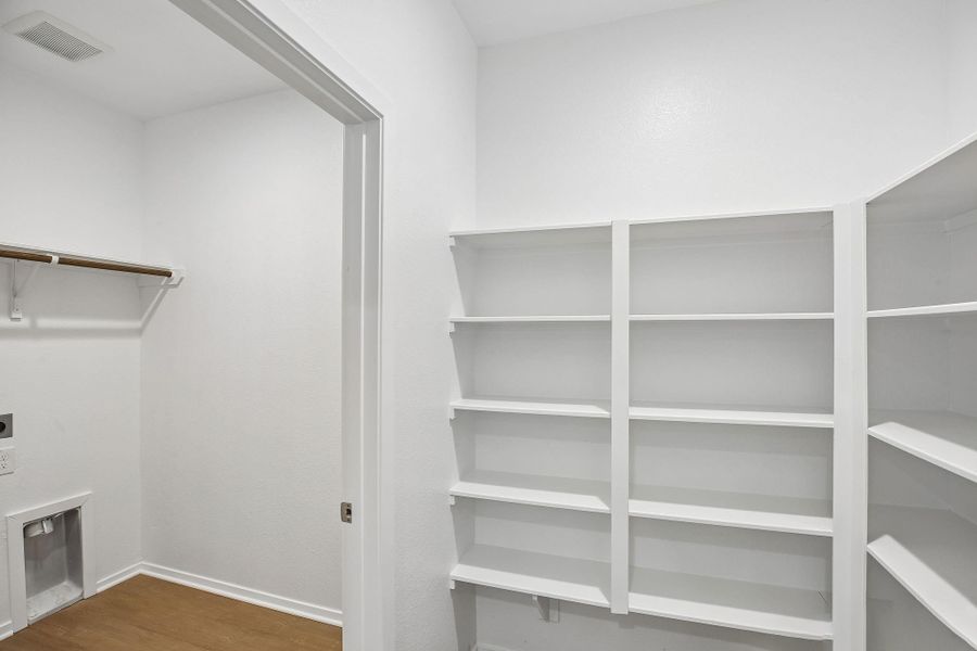 The utility room makes managing everyday tasks easy while keeping everything neat and accessible.