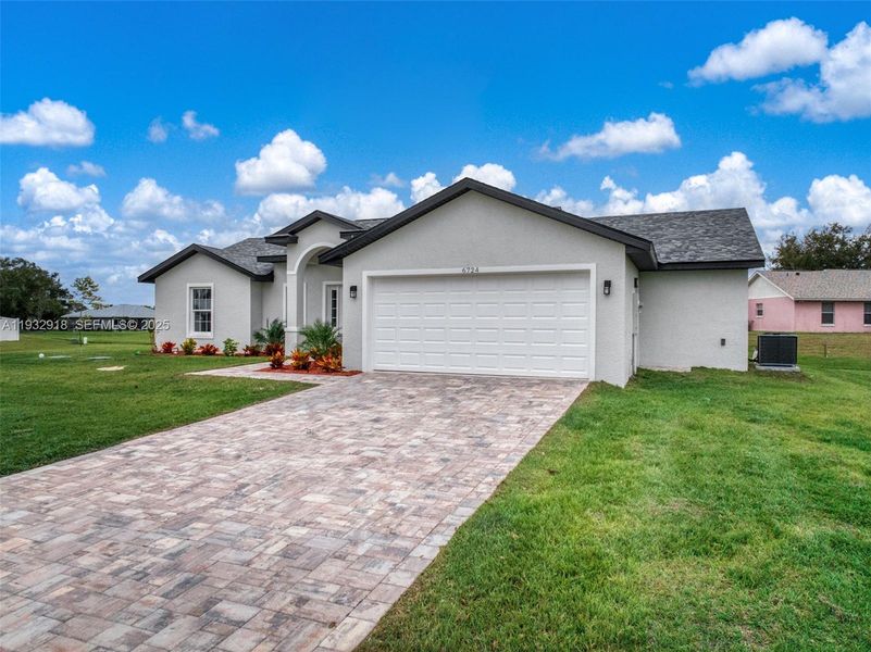 Front exterior of a new home in , Sebring, FL, highlighting curb appeal (Image 25).