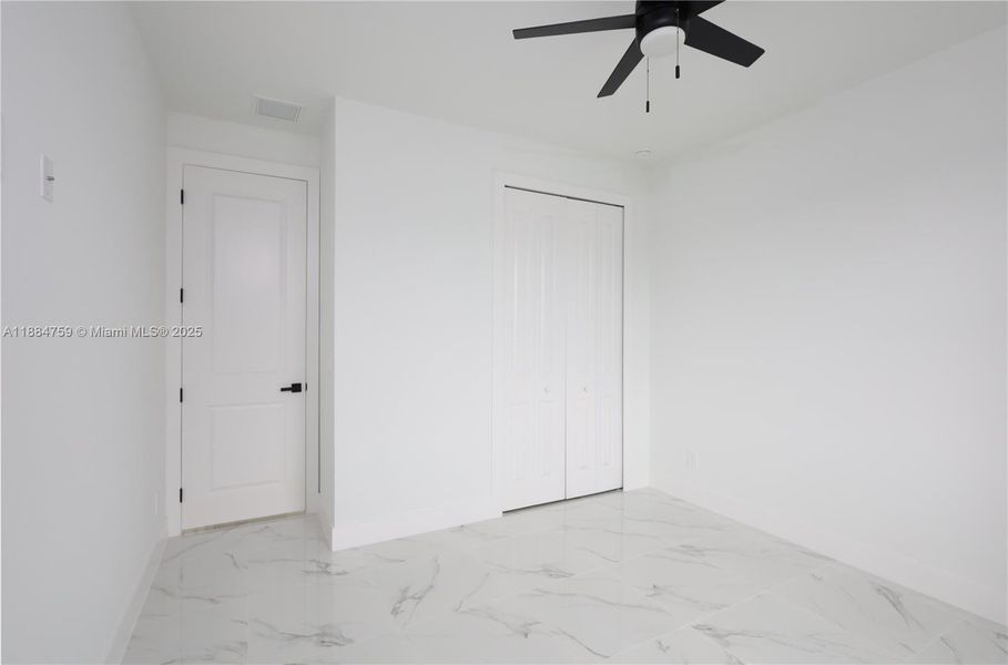 Spacious, unfurnished interior of a new home in , Lehigh Acres (Image 12).