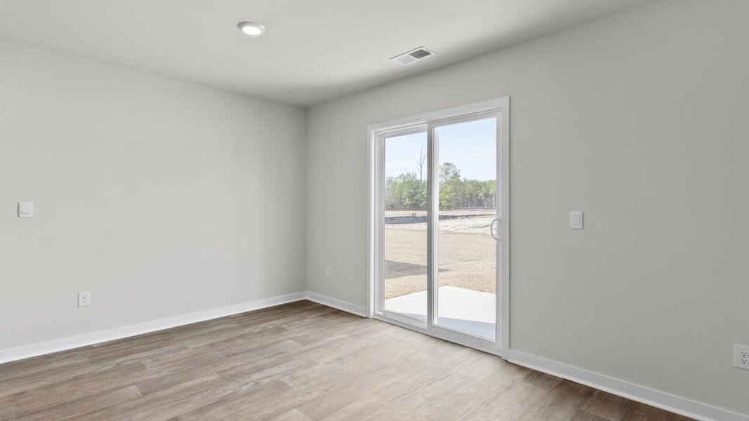 Spacious, unfurnished interior of a new home in Sidbury Station, Castle Hayne (Image 20).