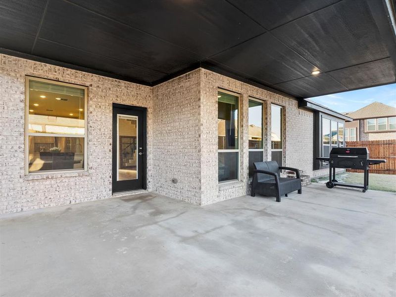 Exterior details and patio area of a home in Star Ranch, Godley (Image 4).