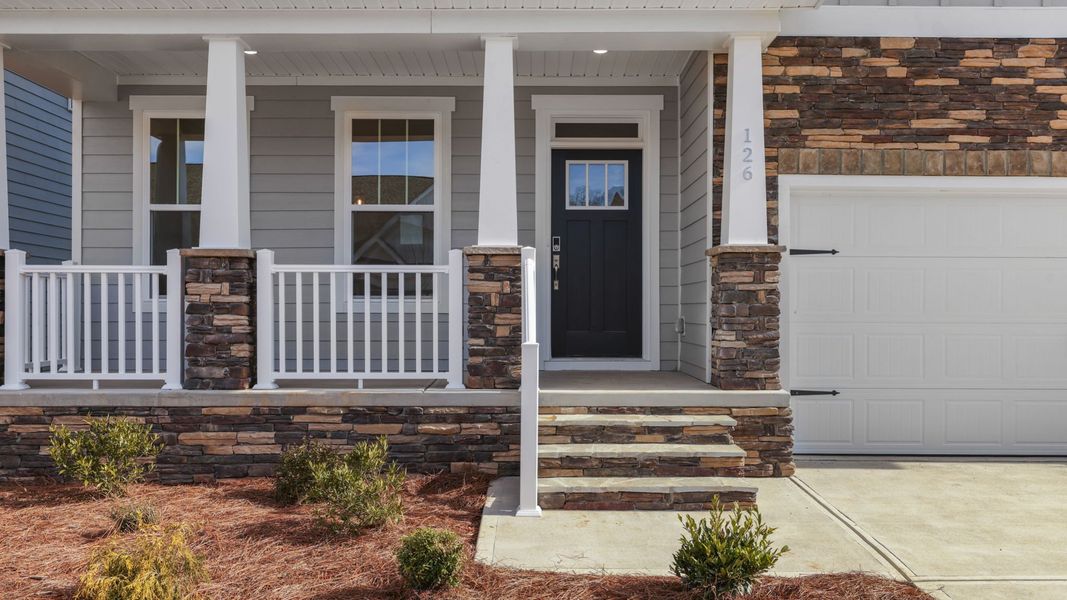Exterior details and patio area of a home in Whitehawk Meadows, Travelers Rest (Image 3).