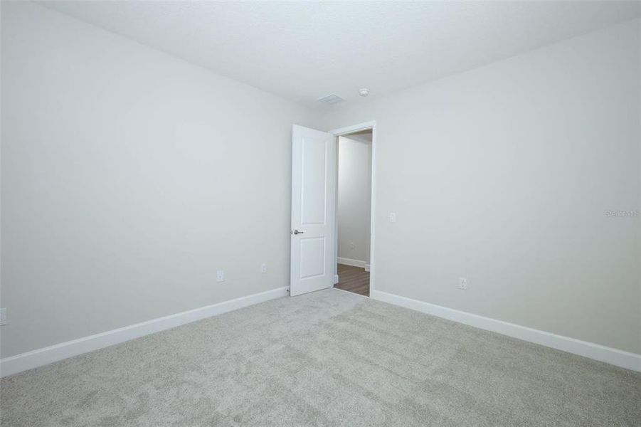 Spacious, unfurnished interior of a new home in Wolf Lake Ranch, Apopka (Image 27).