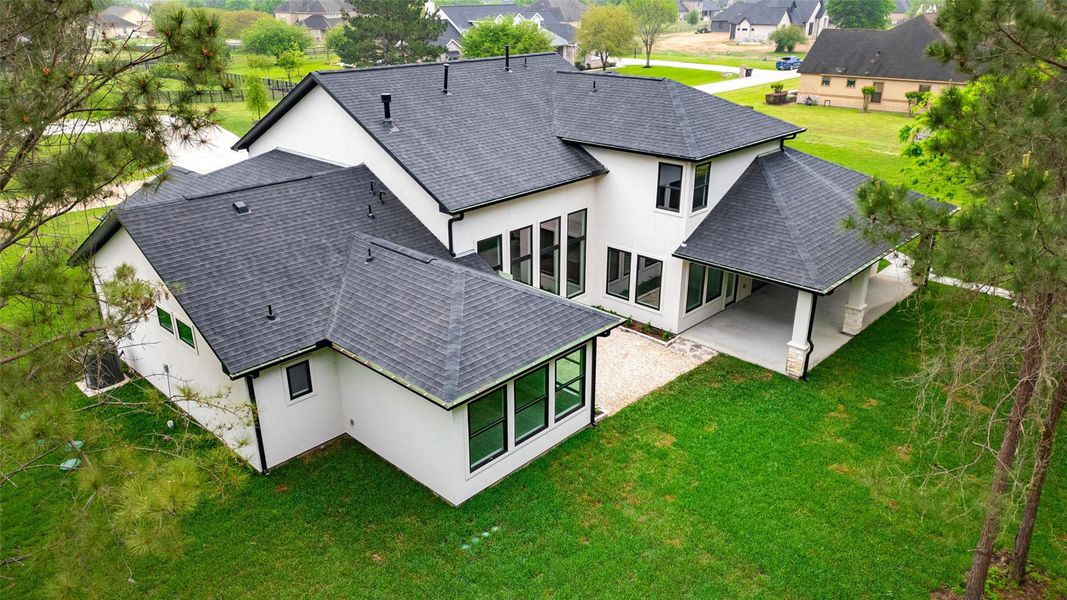 Exterior details and patio area of a home in , Tomball (Image 3).