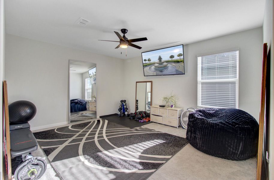 Furnished interior view inside a new home in Sanctuary Cove at Cane Bay, Summerville (Image 13).