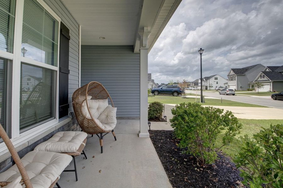 Exterior details and patio area of a home in Oakley Pointe, Moncks Corner (Image 29). Exterior details and patio area of a home in Oakley Pointe, Moncks Corner (Image 29).
