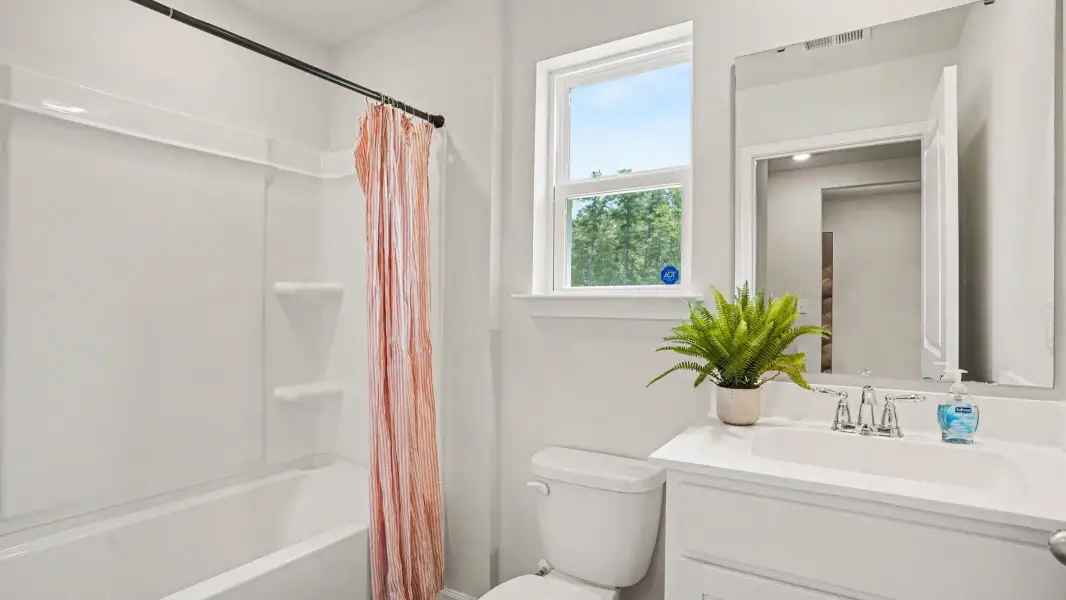 Furnished interior view inside a new home in Evington Place, Longs (Image 13).