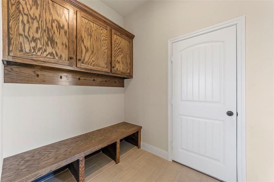 Mudroom featuring light wood-type flooring