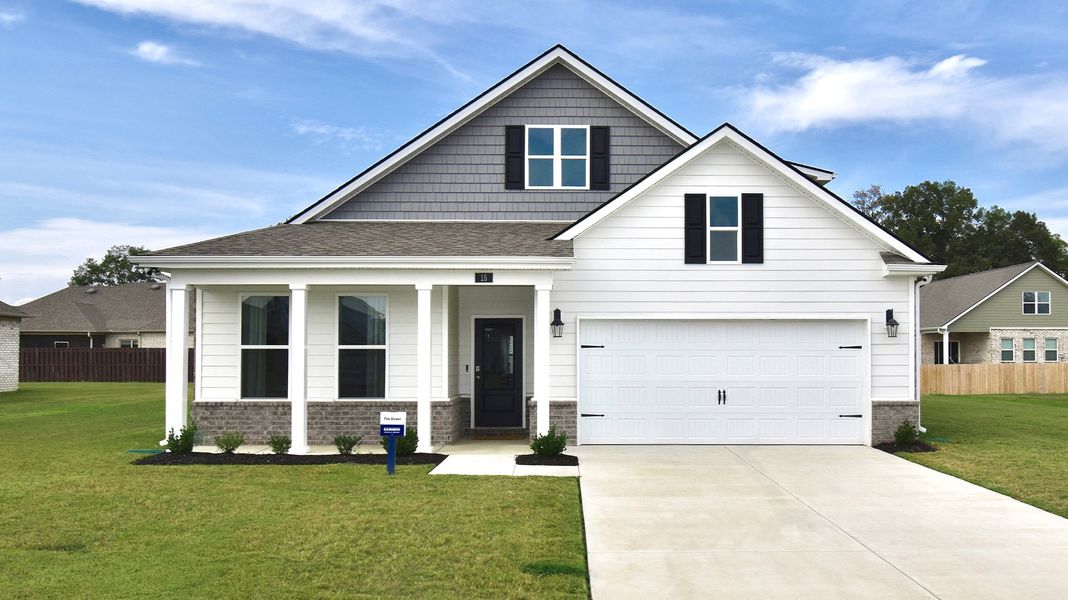 Front exterior of a new home in Shiloh Springs, Jackson, TN, highlighting curb appeal (Image 1).